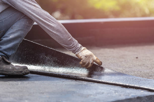 Professional Basement Waterproofing technician working in Whitehall, WI